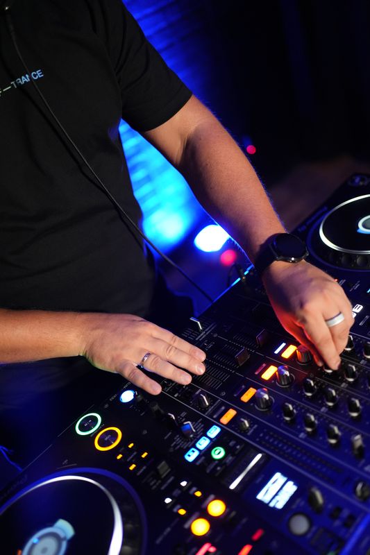 Hands on the DJM-900NXS2 mixer